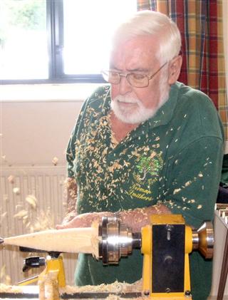 Norman has the shavings flying